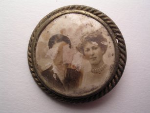 Old brooch incorporating photograph