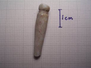 Miniature pestle for pills?